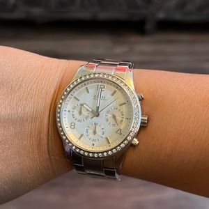 watch, water resistant, stainless steel back. Hardly worn.